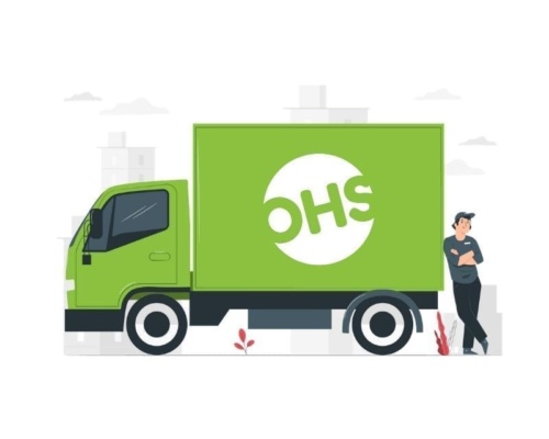 A person leans against a green delivery lorry with OHS on the side, as faint city buildings and small plants surround them, while a VoIP call buzzes softly in their ear.