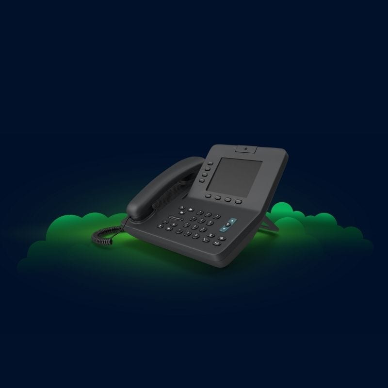 A sleek black office telephone with a digital screen and keypad is artfully displayed against a dark blue background, accented by green cloud-like shapes—a perfect representation of modern cloud business telephones.