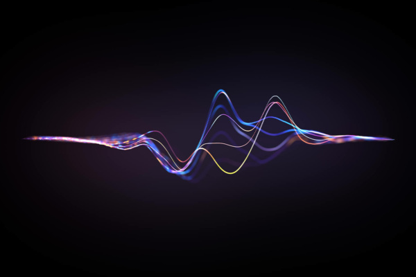 Colourful, wavy lines resembling a digital sound wave or frequency spectrum appear against a dark background, with gradients of blue, purple and yellow light.