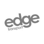 Edge Transport A logo featuring the words edge transport in lowercase, grey font on a transparent background.