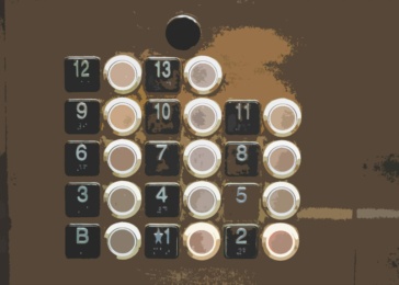 Close-up of a lift button panel displaying floors B, 1-13, reminiscent of an IVR systems keypad. The buttons feature black backgrounds with white numbers, and some buttons are illuminated like those on hold.