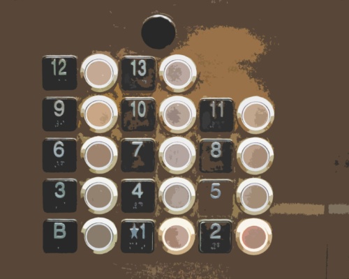 elevator-button Close-up of a lift button panel displaying floors B, 1-13, reminiscent of an IVR systems keypad. The buttons feature black backgrounds with white numbers, and some buttons are illuminated like those on hold.