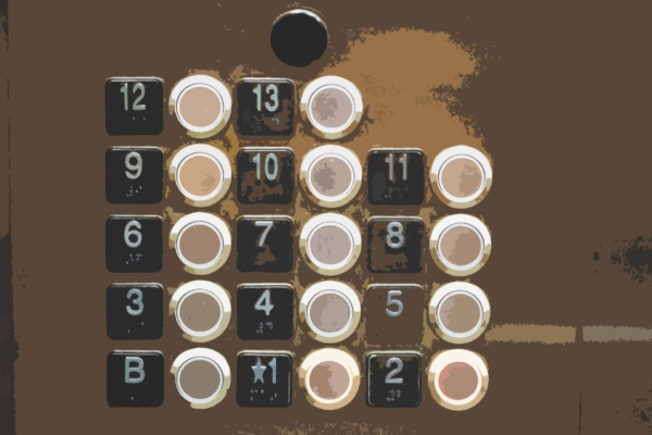 Close-up of a lift button panel displaying floors B, 1-13, reminiscent of an IVR systems keypad. The buttons feature black backgrounds with white numbers, and some buttons are illuminated like those on hold.