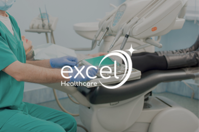 Excel Healthcare Case Study A dental professional in green scrubs from Excel Healthcare operates equipment next to a patient lying on a chair.