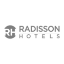 Radisson Hotels logo in grey text with an abstract RH symbol on the left.