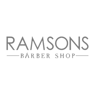 Grey logo with text RAMSONS BARBER SHOP in capital letters and a line above and below BARBER SHOP.