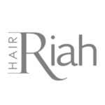 Riah Hair Logo for Hair Riah featuring the word Hair placed vertically beside Riah in grey font on a white background.