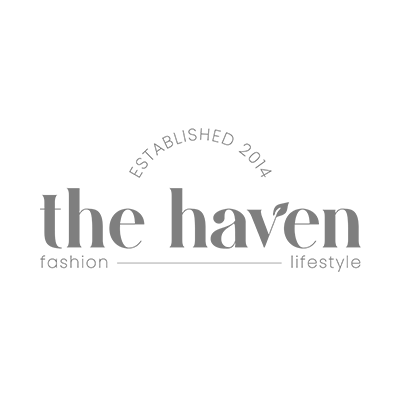 Logo for The Haven with the tagline Fashion Lifestyle and the text Established 2014 above the brand name. The v in Haven features a leaf accent.